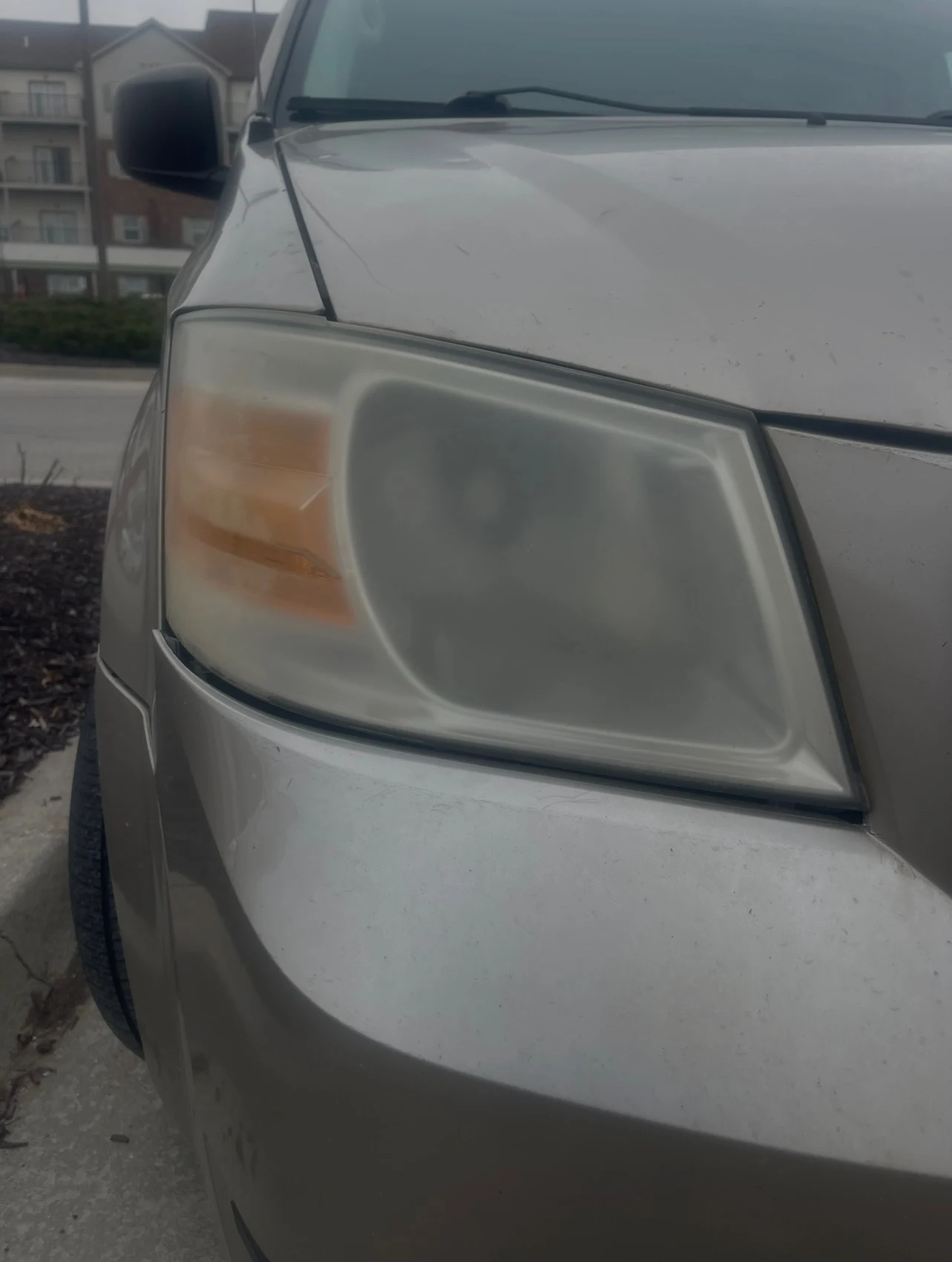 Before restoration - cloudy oxidized headlight